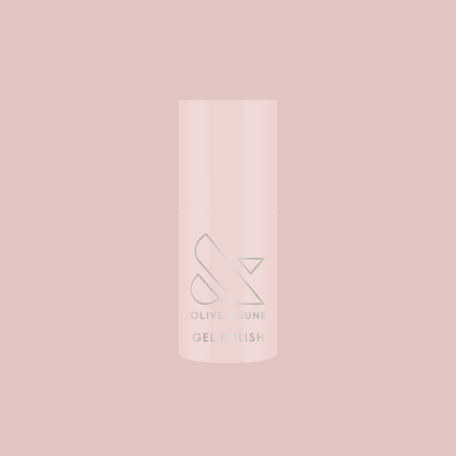 Olive and June Dream Job - Gel polish bottle in milky sheer pink on matching soft pink background