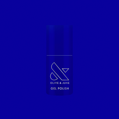Bottle of Your Mani Looks So Good in Those Jeans - Gel nail polish in bright denim blue with Olive and June branding