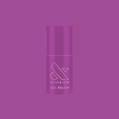 Bottle of Olive and June Petal - Gel polish in vibrant floral purple shade on matching purple background