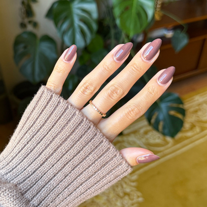 Hand with glossy Goal Getter - Gel manicure in a rich chocolatey neutral shade with subtle shimmer on medium-length nails