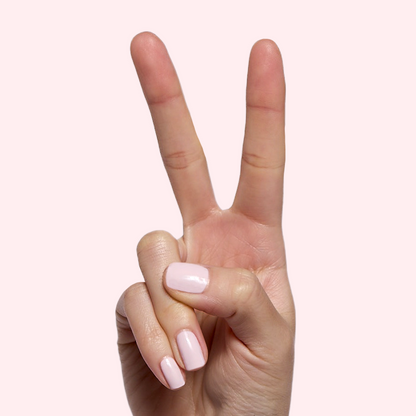 Brave Blush pastel pink polish on natural nails showing a smooth, glossy finish for easy at-home manicure looks